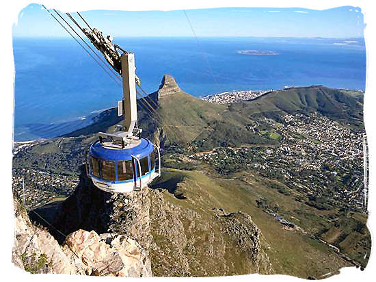 Cable car moving up Table Mountain - South Africa Tours, Travel and Tourism Guide