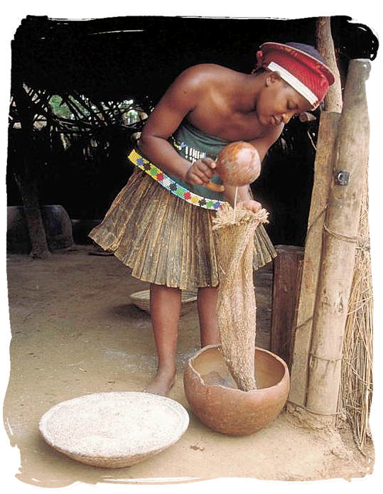  Zulu lady making traditional African beer - South Africa's 
Traditional African Food