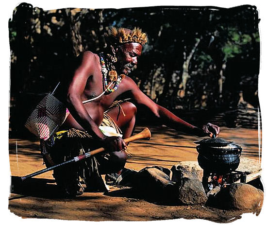 Zulu warrior cooking “potjie”, food like in the old days - Delicious food in South Africa, South African food guide
