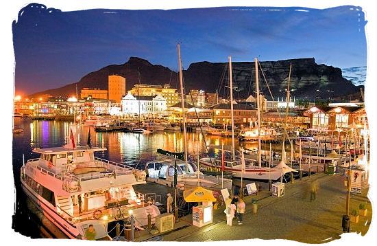 Victoria and Alfred Waterfront with the silhouette of table Mountain in the background