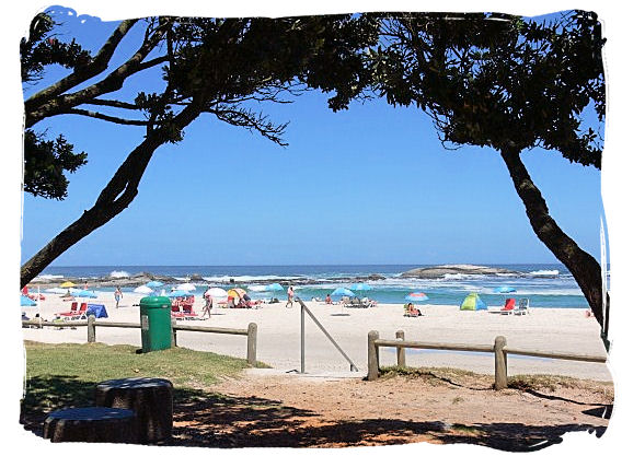 Camps Bay a place with glorious white sandy beaches fringed by palm trees, with a trendy nightlife