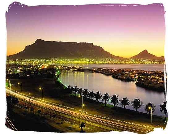 The glittering lights of Cape Town at dusk with Table Mountain as backdrop - Table Mountain Cape Town South Africa 