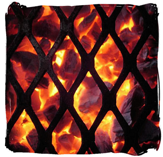 Great coals from a wood fire, almost ready for the braai - South African barbecue tips and ideas