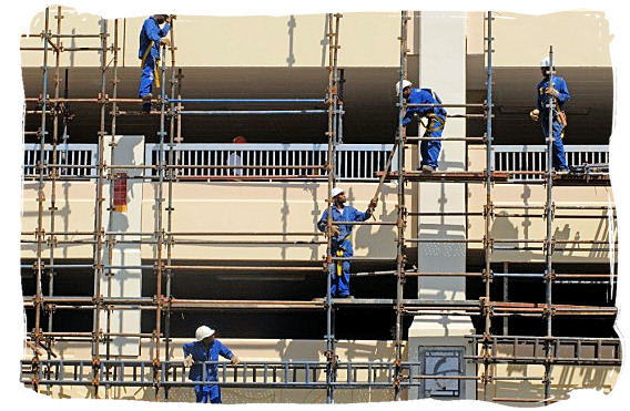 Construction of an upmarket residential development near the harbour in Durban - South African national anthem