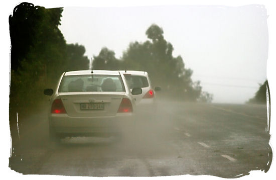 Low visibility and slippery conditions driving in a thunder storm