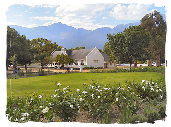 The old Dutch Reformed church in Franschhoek built in typical Cape Dutch style - The French Huguenots and the Huguenot Museum in South Africa