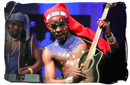 Young guitar player enjoying himself - Xhosa Tribe, Xhosa Language and Xhosa Culture in South Africa