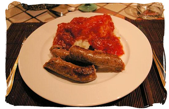 Pap, Vleis en sous - maize porridge, meat and sauce, the staple diet of the nomadic lifestyle of the Bantu tribes and the Voortrekkers (migrant farmers) of the days of old - South Africa food history and culture