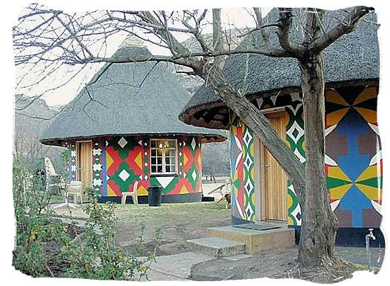 Rondavels in the Glen Reenen rest camp decorated with the traditional painting of the Basotho people - Golden Gate Highlands National Park