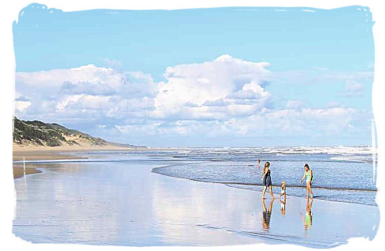 Family fun on Morgan Bay beach at St. Lucia, South Africa