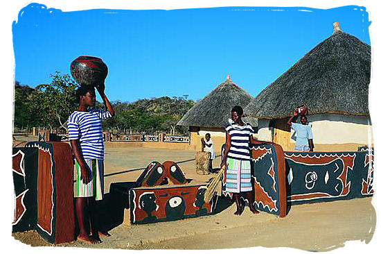 Venda ladies at the entrance of a cultural village - Black People in South Africa, Black Population in South Africa