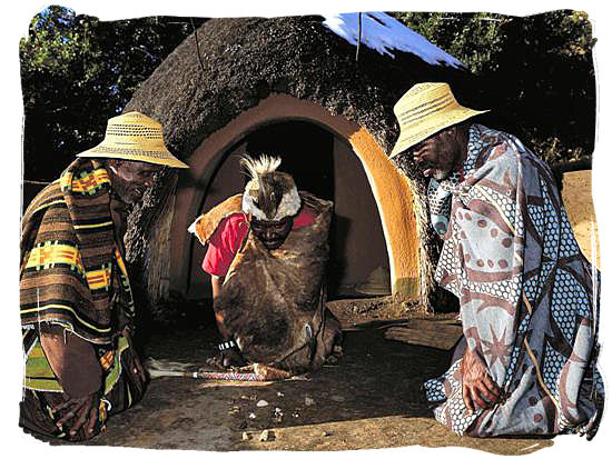 A witch doctor throwing the bones to consult the ancestral spirits - ancient Africa history