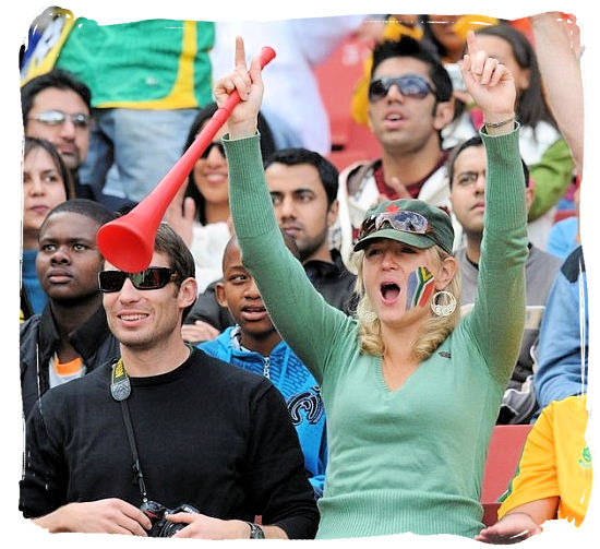 Cheering supporter of the South African football team, holding a Vuvuzela trumpet - Soccer in South Africa, Bafana Bafana South African Soccer Team