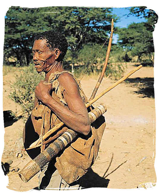 Bushman descendent of the ancient San people with traditional hunting gear - Kgalagadi Transfrontier National Park in the Kalahari, Kgalagadi Photos