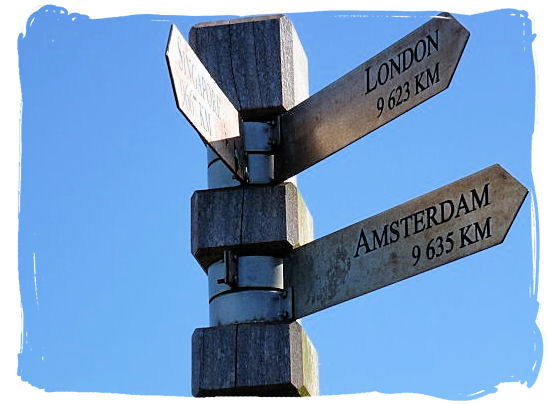 Signpost at the viewing platform on top of Cape Point showing distances to major cities across the world - Discover Cape Point South Africa and the Cape of Good Hope