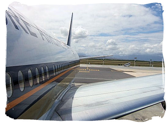 A Singapore Airlines airplane on the platform of Cape Town International Airport - Cheap Flights to Cape Town International Airport South Africa 