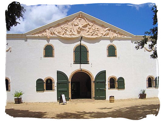 Cloete Cellar building, the original wine cellar at the estate. The pediment gable is by the sculptor Anton Anreith - Groot Constantia, the Oldest South Africa Wine Country Estate