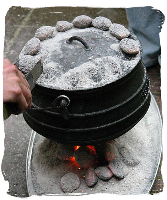 Simmering potjie - pot food (Potjiekos) in South Africa