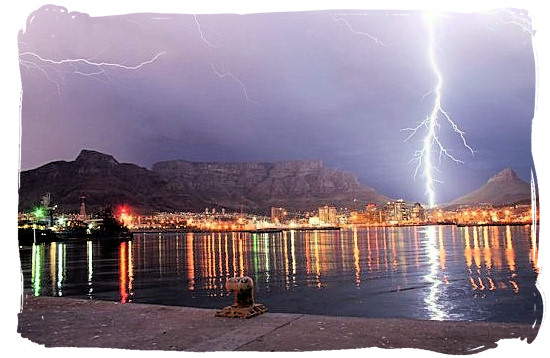 Cape Town harbour and Table Mountain lit up by lightning - Cape Town weather forecast, South Africa weather facts